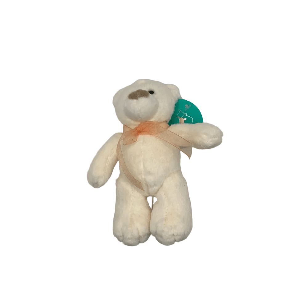 Charlie Bear with a gold ribbon