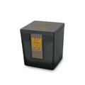 Vanilla and White Woods Candle in a square black container with a bamboo lid and label.