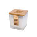 Bamboo and Ginger Lily Candle in a glass container with a bamboo lid and stylish label.