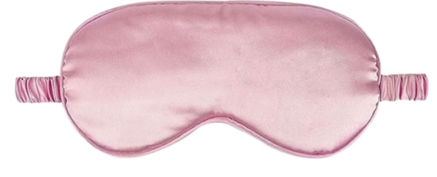 Satin Sleep Mask in soft pink color, designed for comfort and restful sleep, ideal for sore and tired eyes.